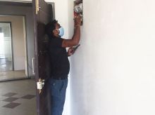 MACJ team performing electrical inspection of a home